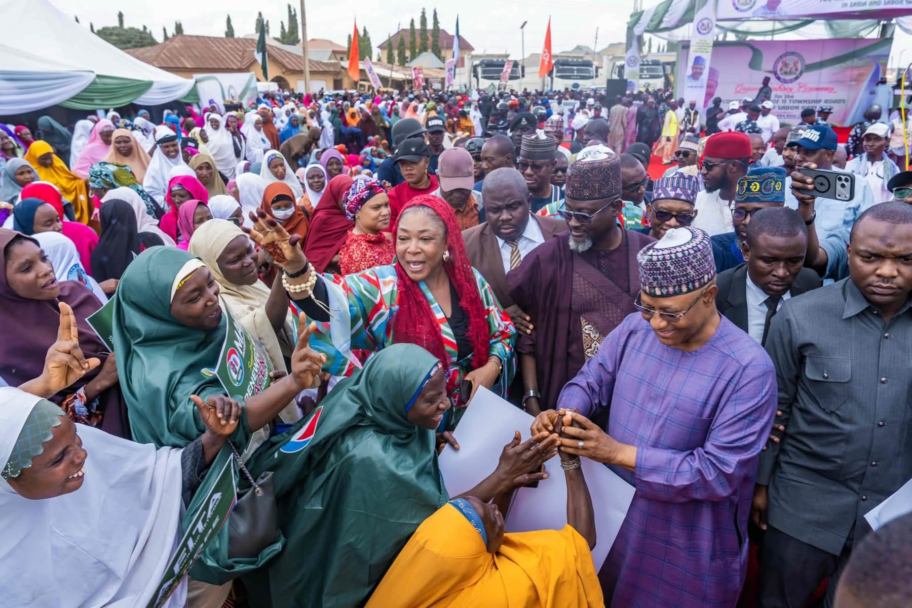 Governor Uba Sani greet residents of Zaria and Sabon Gari LGAs during the flag-off of 11 Road Projects