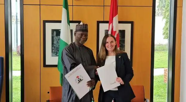 Mohammed Ahmed Tijjani, director of air transport management at the ministry of aviation and aerospace development, and Shendra Melia, Canada's chief air negotiator for global affairs. Tijjani represented Festus Keyamo at the signing ceremony.