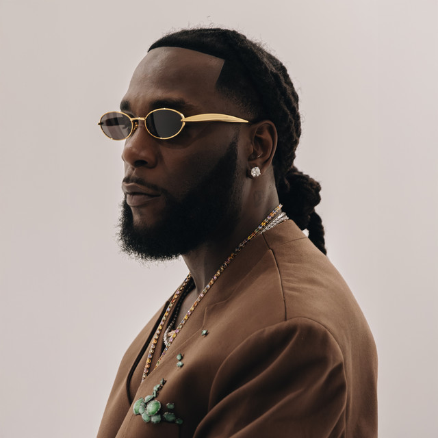 Burna Boy Honors Grandfather Pa Benson Idonije Ahead of 90th Birthday 